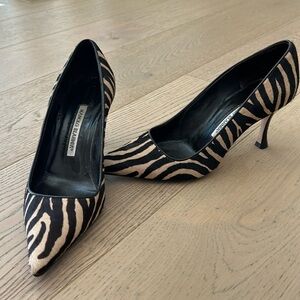 Cowhide Manolos brown and tan zebra print. Good used condition.
